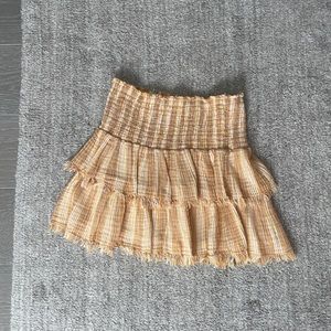 The cutest skirt. Perfect with any top since it has lots of warm tones in it.